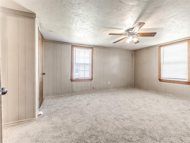 211 S 6th St, Mcloud, OK 74851 - carpeted spare room with ceiling fan and a textured ceiling