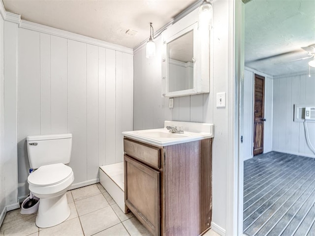 211 S 6th St, Mcloud, OK 74851 - bathroom with vanity, toilet, baseboards, tile patterned flooring, and a textured ceiling