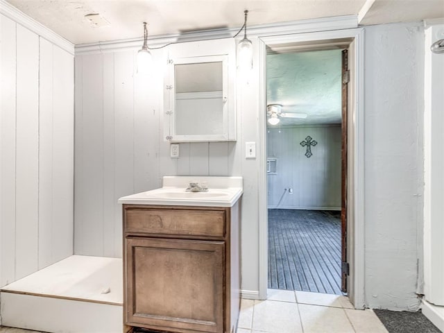211 S 6th St, Mcloud, OK 74851 - bathroom featuring vanity, tile patterned flooring, and ceiling fan