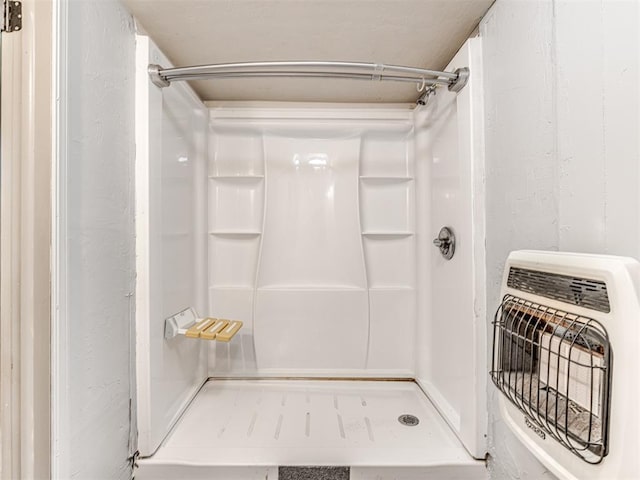 211 S 6th St, Mcloud, OK 74851 - full bath with heating unit and a shower stall