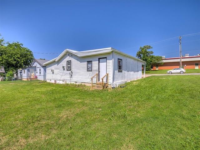 211 S 6th St, Mcloud, OK 74851 - view of side of property with entry steps, a yard, and crawl space