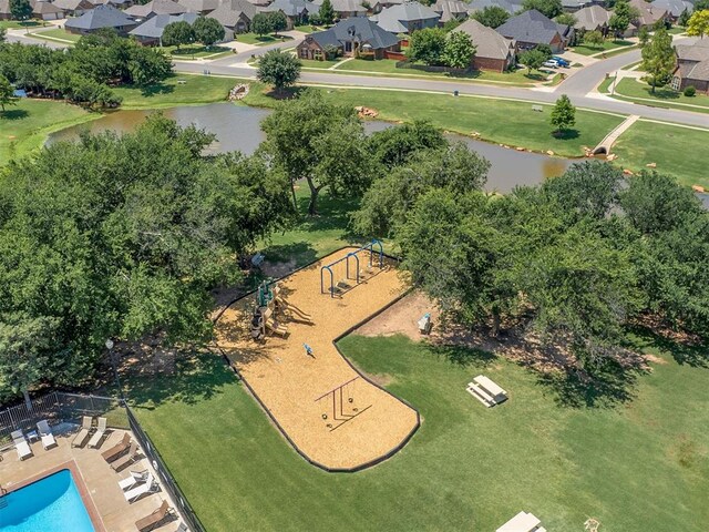 1316 NW 171st St, Edmond, OK 73012 - aerial perspective of suburban area featuring a park and a large body of water