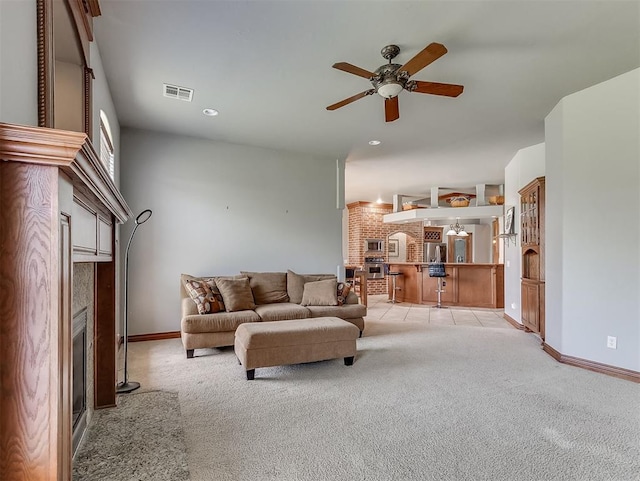 1316 NW 171st St, Edmond, OK 73012 - living area featuring a fireplace, light colored carpet, ceiling fan, and recessed lighting
