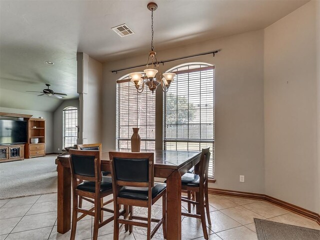 1316 NW 171st St, Edmond, OK 73012 - dining area featuring a chandelier, light tile patterned floors, ceiling fan, and lofted ceiling