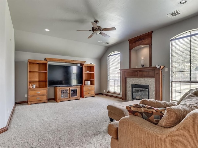 1316 NW 171st St, Edmond, OK 73012 - living area with a ceiling fan, light colored carpet, vaulted ceiling, a glass covered fireplace, and recessed lighting