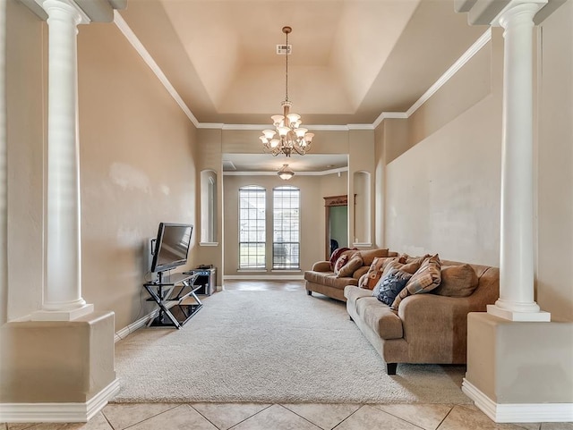 1316 NW 171st St, Edmond, OK 73012 - living area with ornate columns, tile patterned flooring, carpet flooring, a tray ceiling, and ornamental molding