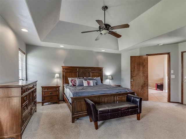 1316 NW 171st St, Edmond, OK 73012 - bedroom featuring light carpet, a raised ceiling, a ceiling fan, and recessed lighting