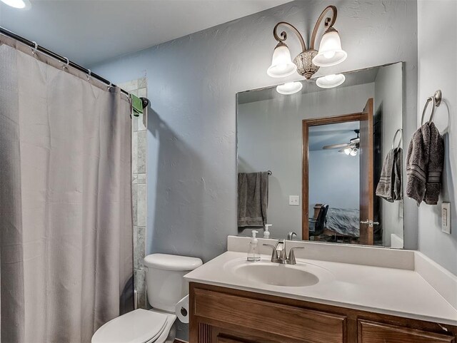 1316 NW 171st St, Edmond, OK 73012 - ensuite bathroom featuring vanity, a shower with shower curtain, and a ceiling fan