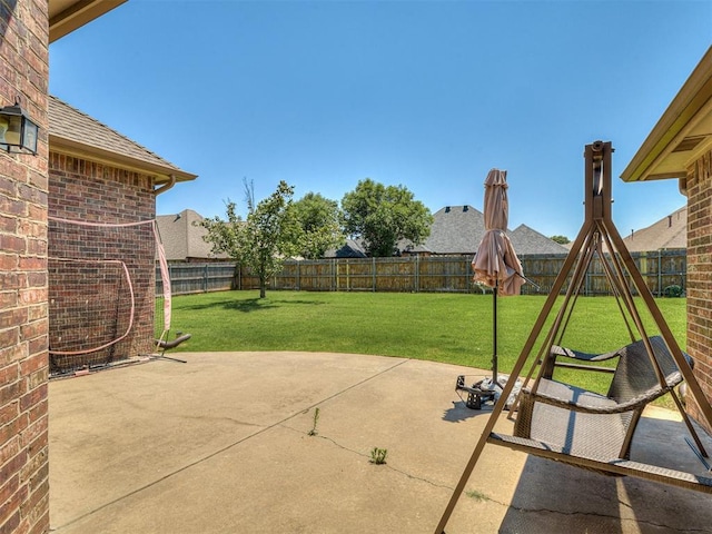 1316 NW 171st St, Edmond, OK 73012 - fenced backyard featuring a patio area and a playground