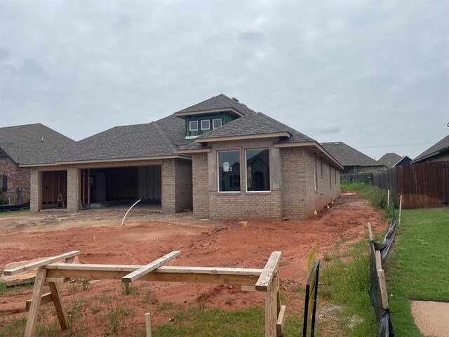 4601 Hidalgo Ave, Mustang, OK 73064 - view of front of property with brick siding, roof with shingles, and a garage