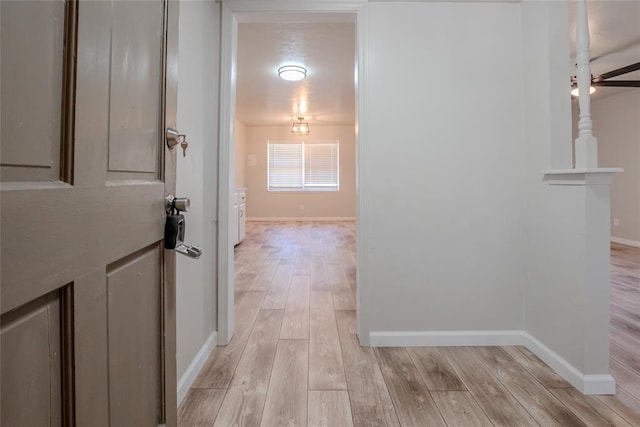 1725 E Lindsey St Unit 2, Norman, OK 73071 - corridor with light wood-type flooring and baseboards