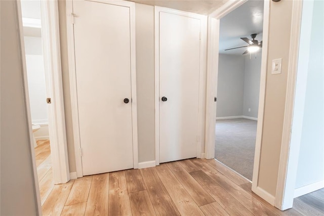 1725 E Lindsey St Unit 2, Norman, OK 73071 - corridor featuring light wood-type flooring and baseboards