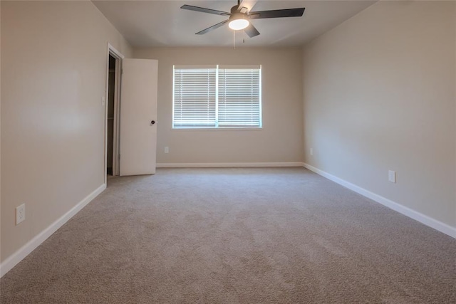 1725 E Lindsey St Unit 2, Norman, OK 73071 - spare room with ceiling fan and carpet flooring