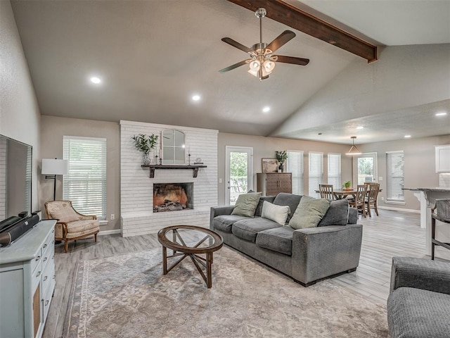 6513 NW 95th St, Oklahoma City, OK 73162 - living area with light wood-style floors, beamed ceiling, plenty of natural light, recessed lighting, and a ceiling fan
