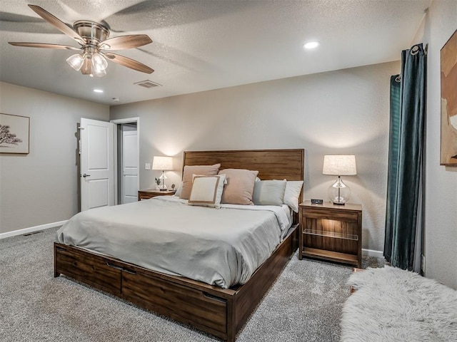 6513 NW 95th St, Oklahoma City, OK 73162 - bedroom with carpet floors, baseboards, ceiling fan, a textured ceiling, and recessed lighting