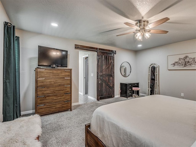 6513 NW 95th St, Oklahoma City, OK 73162 - carpeted bedroom featuring a barn door, recessed lighting, ceiling fan, and baseboards