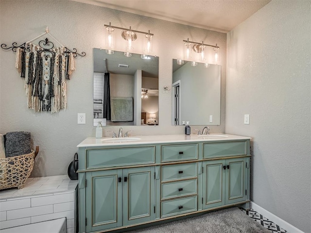 6513 NW 95th St, Oklahoma City, OK 73162 - bathroom with double vanity and ceiling fan