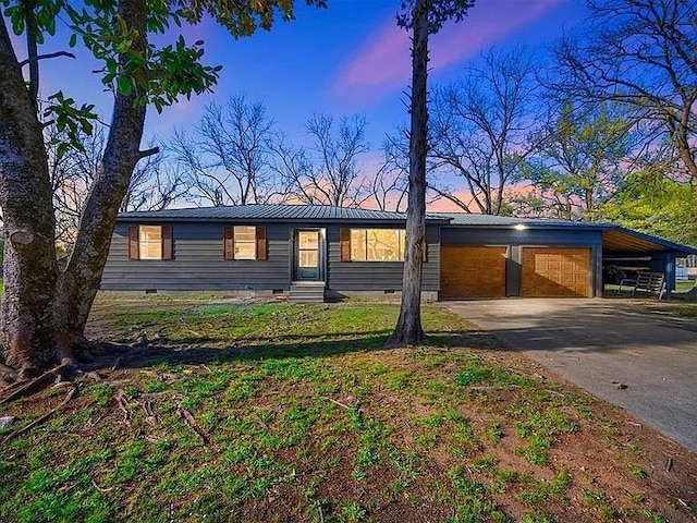 309 E Memorial St, Broken Bow, OK 74728 - view of front of home with concrete driveway, crawl space, metal roof, and entry steps