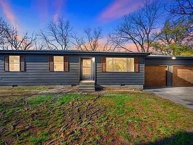 309 E Memorial St, Broken Bow, OK 74728 - view of front of home featuring crawl space, driveway, and entry steps
