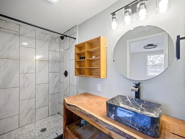 309 E Memorial St, Broken Bow, OK 74728 - full bathroom featuring a tile shower and vanity