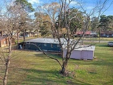 309 E Memorial St, Broken Bow, OK 74728 - view of green lawn