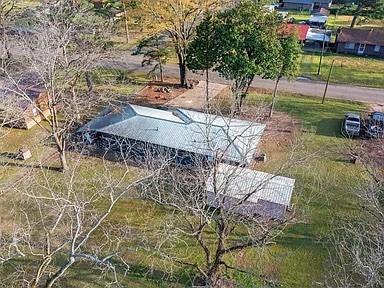 309 E Memorial St, Broken Bow, OK 74728 - aerial view of property and surrounding area