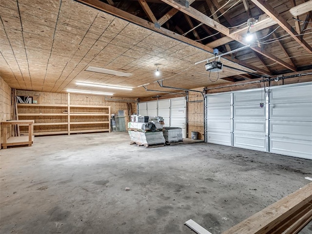 16101 S Rock Creek Rd, Shawnee, OK 74801 - garage featuring a garage door opener
