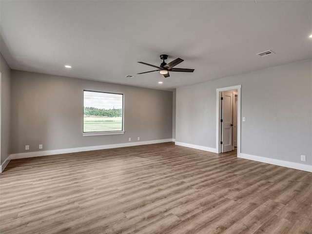 16101 S Rock Creek Rd, Shawnee, OK 74801 - spare room featuring wood finished floors, ceiling fan, baseboards, and recessed lighting
