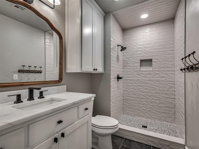 16101 S Rock Creek Rd, Shawnee, OK 74801 - bathroom with vanity, a stall shower, toilet, recessed lighting, and tile patterned floors