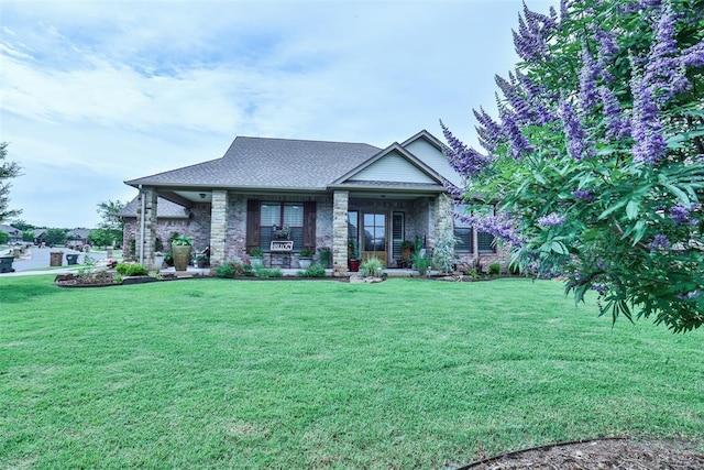 3434 Crampton Gap Way, Norman, OK 73069 - view of front of home with a front lawn, roof with shingles, a porch, and brick siding