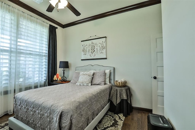 3434 Crampton Gap Way, Norman, OK 73069 - bedroom with ornamental molding, wood finished floors, and ceiling fan
