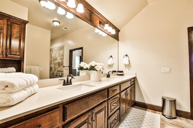 3434 Crampton Gap Way, Norman, OK 73069 - bathroom with double vanity, lofted ceiling, and tiled shower