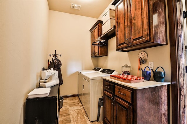 3434 Crampton Gap Way, Norman, OK 73069 - laundry room featuring cabinet space, independent washer and dryer, and light marble finish floors