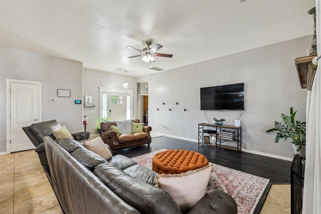 2913 Elmo Way, Oklahoma City, OK 73160 - living room featuring ceiling fan and baseboards
