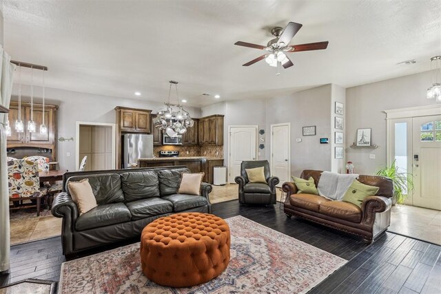 2913 Elmo Way, Oklahoma City, OK 73160 - living area with a ceiling fan, a chandelier, recessed lighting, and wood finished floors
