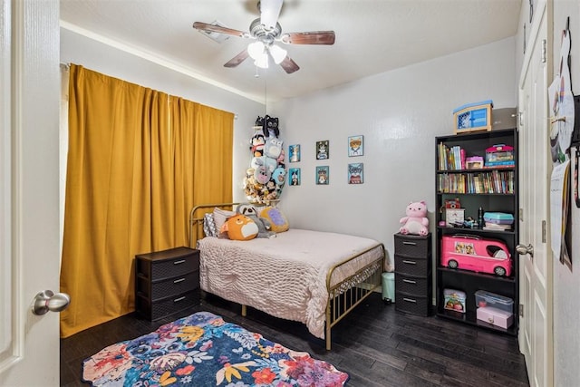 2913 Elmo Way, Oklahoma City, OK 73160 - bedroom with dark wood-type flooring and a ceiling fan
