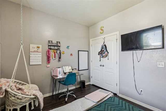 2913 Elmo Way, Oklahoma City, OK 73160 - bedroom featuring dark wood-style floors, baseboards, a desk, and a closet