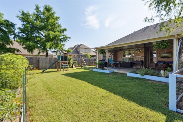 2913 Elmo Way, Oklahoma City, OK 73160 - view of yard with a playground and a patio