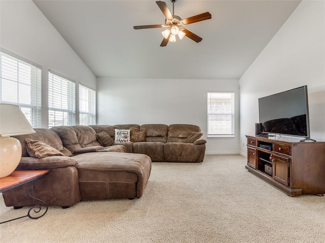 724 Ga Zump Dr, Norman, OK 73069 - carpeted living area featuring high vaulted ceiling, plenty of natural light, a ceiling fan, and baseboards