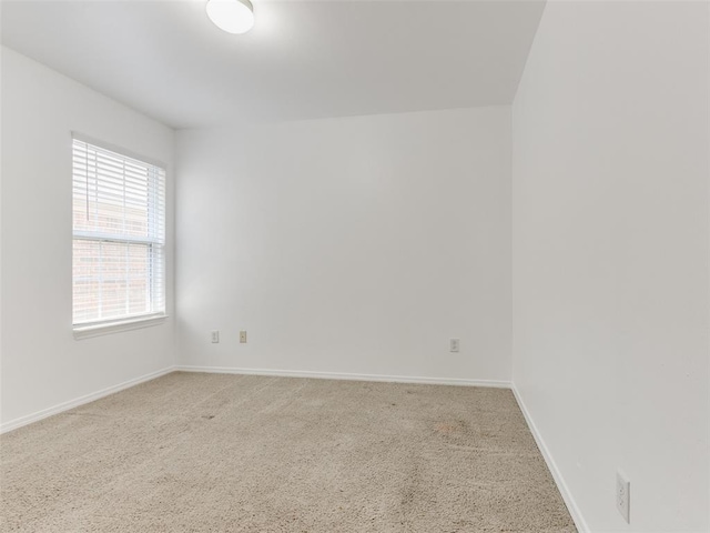 724 Ga Zump Dr, Norman, OK 73069 - carpeted spare room featuring baseboards