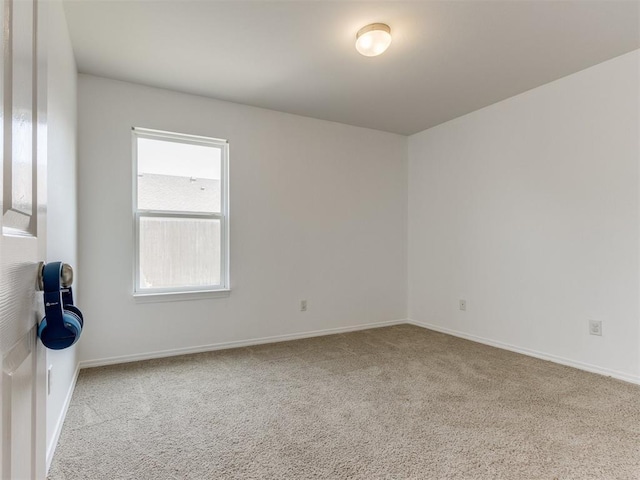 724 Ga Zump Dr, Norman, OK 73069 - carpeted spare room with baseboards