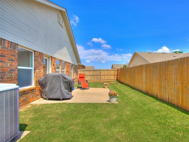 724 Ga Zump Dr, Norman, OK 73069 - view of yard featuring a patio and central air condition unit