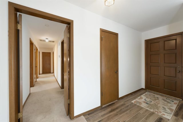 3860 Wake Forest Rd, Edmond, OK 73034 - foyer entrance featuring baseboards and light wood-type flooring