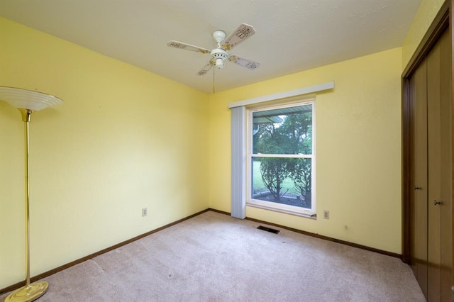 3860 Wake Forest Rd, Edmond, OK 73034 - empty room with light carpet and ceiling fan