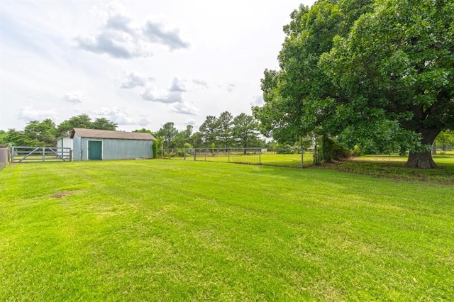 3860 Wake Forest Rd, Edmond, OK 73034 - view of yard with a pole building and an outbuilding