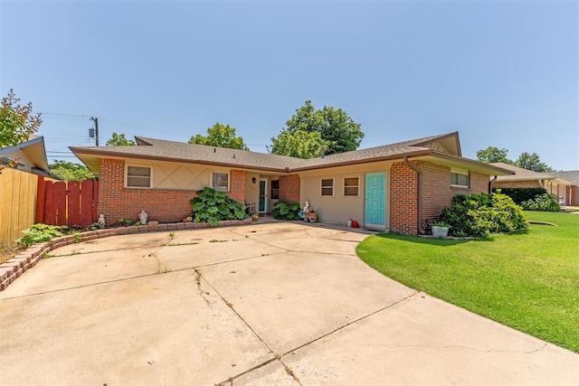 4912 NW 29th St, Oklahoma City, OK 73127 - ranch-style house with brick siding and concrete driveway
