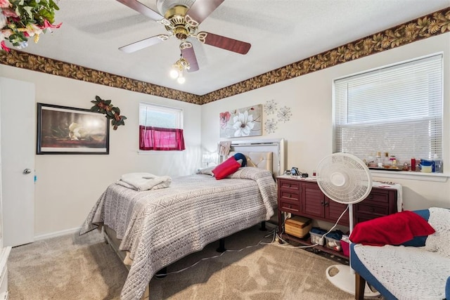 4912 NW 29th St, Oklahoma City, OK 73127 - carpeted bedroom featuring ceiling fan and baseboards