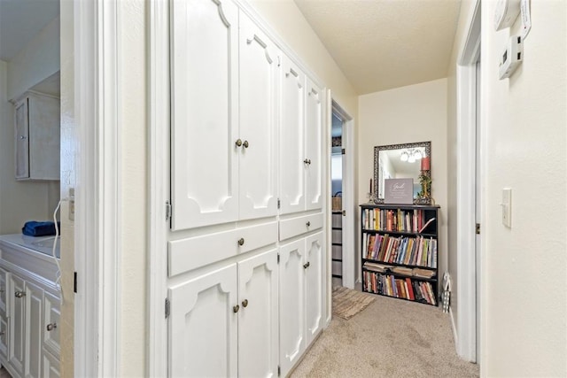 4912 NW 29th St, Oklahoma City, OK 73127 - hallway featuring carpet flooring