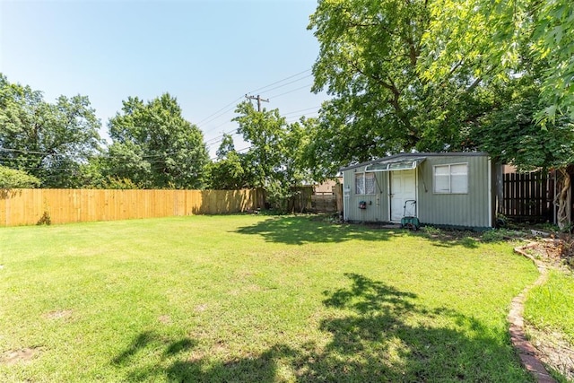 4912 NW 29th St, Oklahoma City, OK 73127 - fenced backyard featuring a storage unit