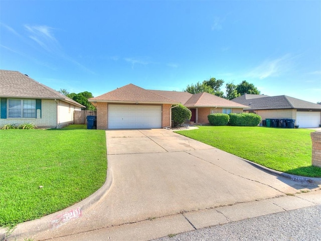 5201 SE 53rd St, Oklahoma City, OK 73135 - ranch-style house with brick siding, an attached garage, and concrete driveway